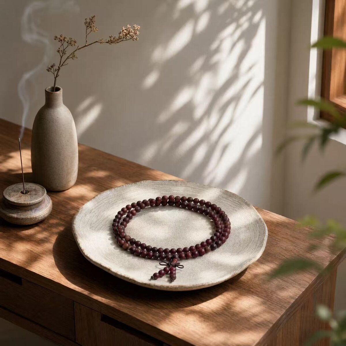 BR-023 dark red beaded bracelet on a table