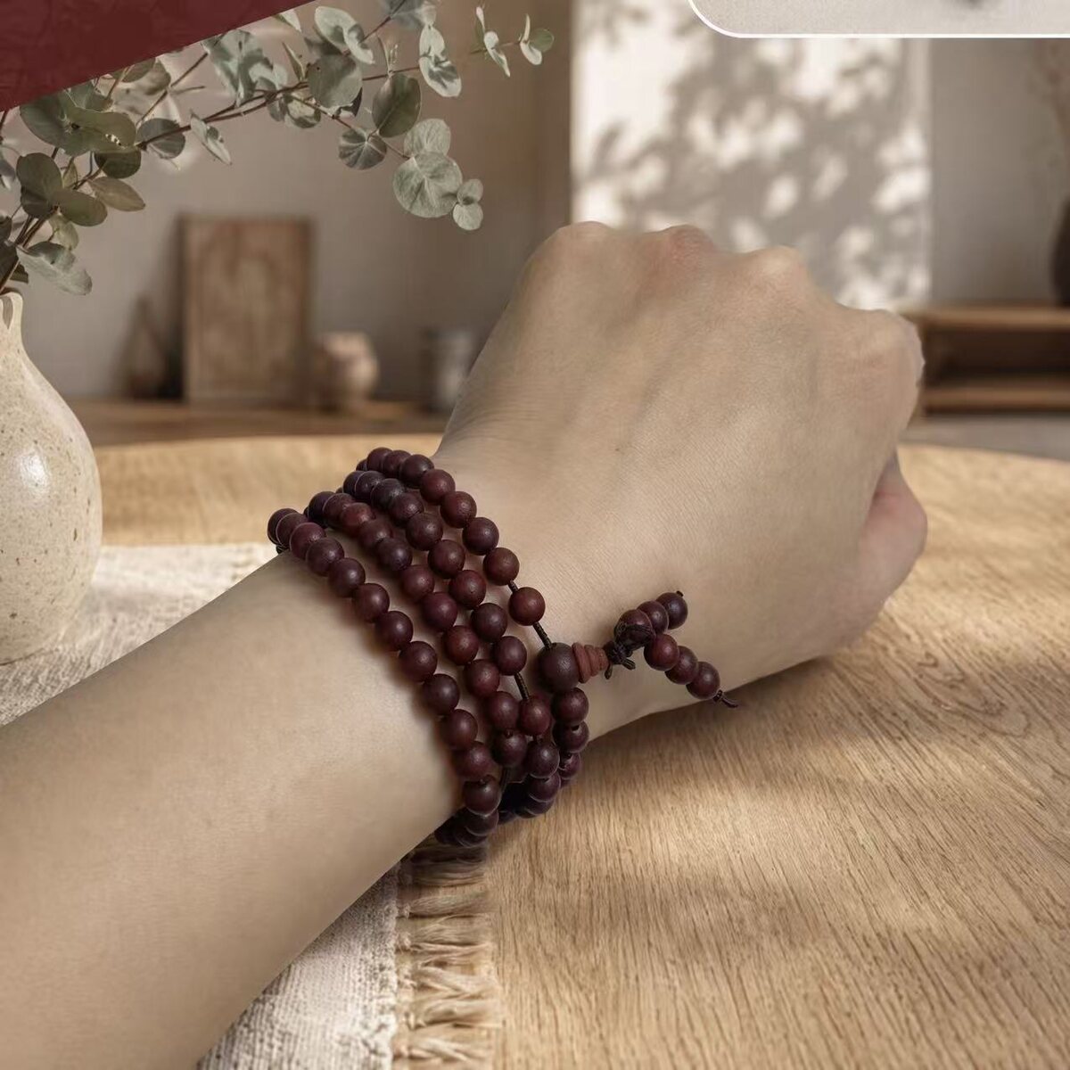 BR-023 dark red bracelet worn on wrist