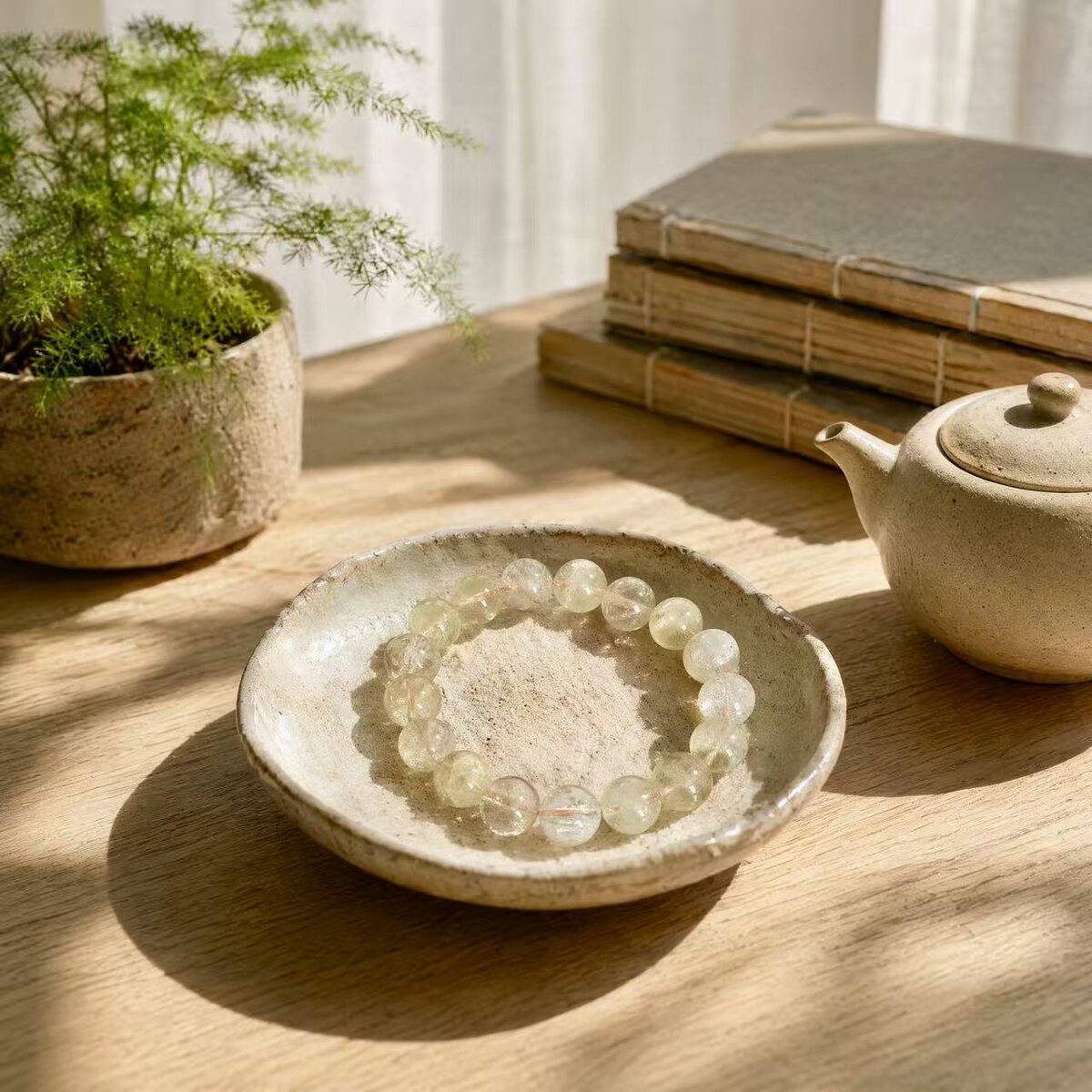 BR-025 pale yellow bracelet on a plate